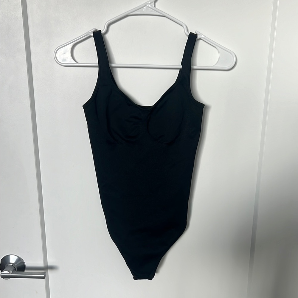 Women’s black bodysuit